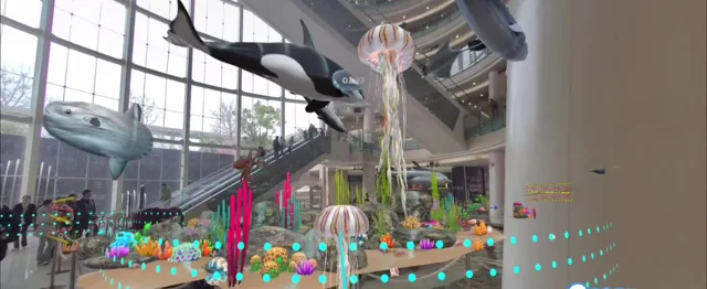 Mixed reality sea creatures appearing in a real shopping mall